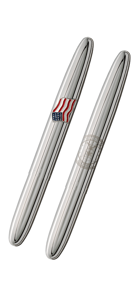 Closed 600-AF-AF chrome bullet space pen with American flag emblem on one side and engraved US Air Force insignia on the other side